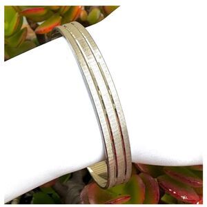 Silver tone bangle bracelet